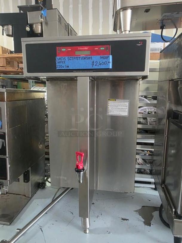 Curtis SCTP15T10A3109 coffee brewer, stainless steel, 220V, 50/60Hz, 1 PH, digital display, well-maintained.