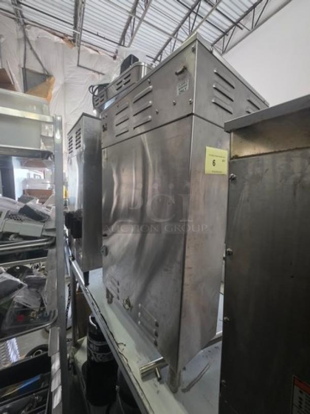 Curtis SCTP15T10A3109 Coffee Brewer, stainless steel, 220V, 50/60Hz, 1PH, in used condition. Model and specs labeled.