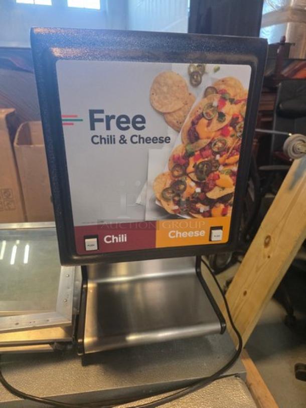 Star HPDE2 all-purpose topping warmer, model HFDE2, 120V. Features controls for chili and cheese. Appears in good condition.