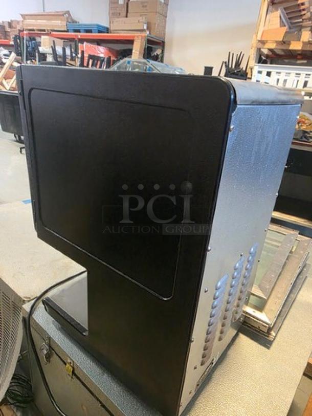 Star HPDE2 Topping Warmer, 120V, black metal exterior, model HFDE2, in good condition. Ideal for kitchen use.