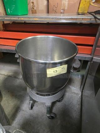 Stainless steel mixing bowl on rolling cart, with yellow tag labeled "13", in good condition.