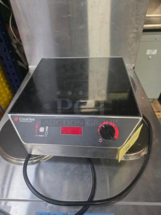 CookTek MC1500 single burner induction cooktop, 1500W. Error code 02 displayed. Slight wear. Countertop model.
