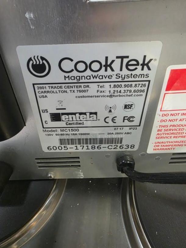 CookTek MC1500 single burner induction cooktop, 1500W. Tag shows "ERROR CODE 02". Entela certified, model info visible.