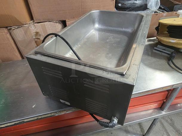 Qualite electric countertop food warmer, full-size pan, stainless steel, used condition, visible power cord.