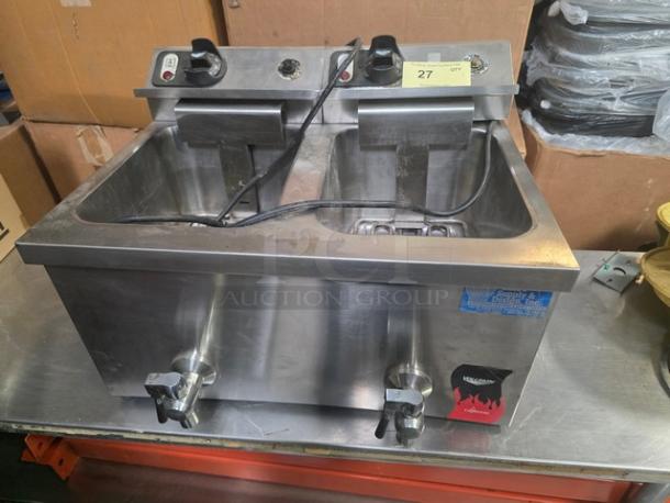 Vollrath Countertop Fryer, model FFA8130, 220V, stainless steel, dual fry wells. Visible power controls, taps, and capacities.