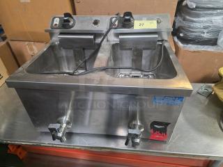 Vollrath Countertop Fryer, model FFA8130, 220V, stainless steel, dual fry wells. Visible power controls, taps, and capacities.