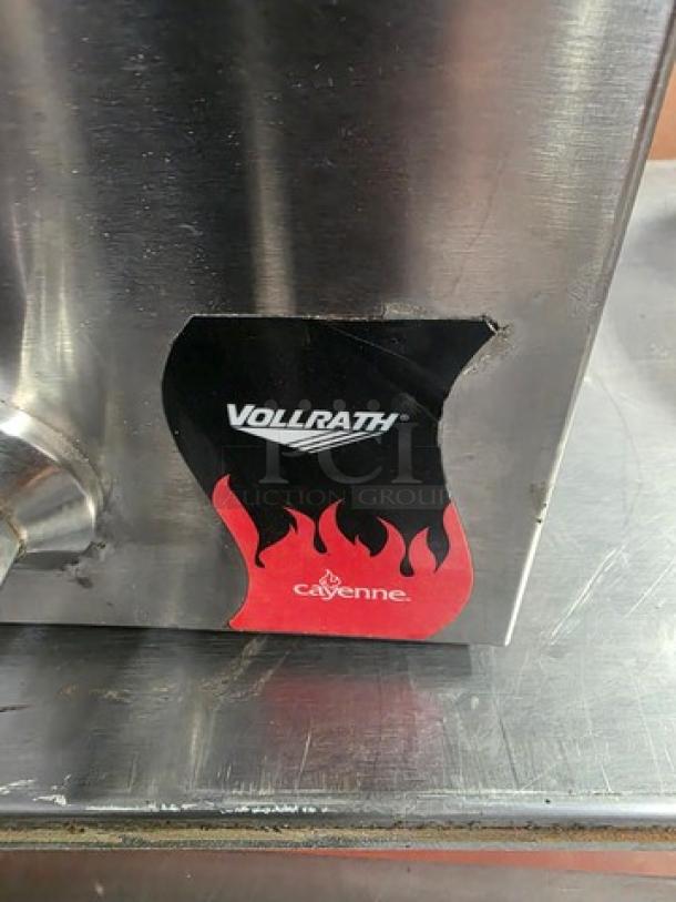 Vollrath countertop fryer, model FFA8130, stainless steel, 220V, 60Hz, 1PH, with Cayenne branding. Visible wear on the exterior.