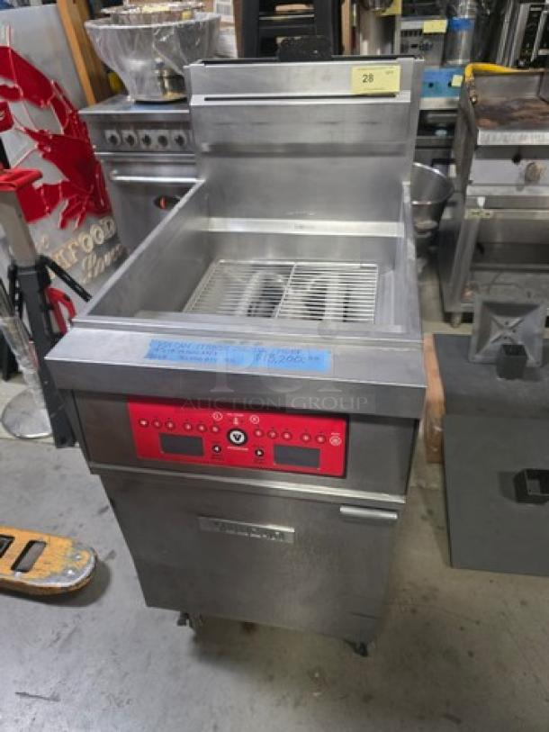 Vulcan 1TR85C-1 PowerFry3 floor fryer, natural gas, 85-90 lb. capacity, computer controls, 90,000 BTU, stainless steel, excellent condition.