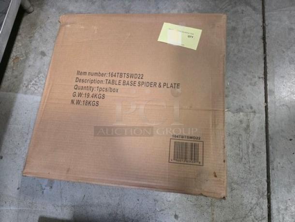 Cardboard box containing a Table Base Spider & Plate, item number 164TBTSWD22, gross weight 19.4 kg, net weight 18 kg.
