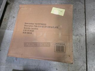 Cardboard box containing a Table Base Spider & Plate, item number 164TBTSWD22, gross weight 19.4 kg, net weight 18 kg.
