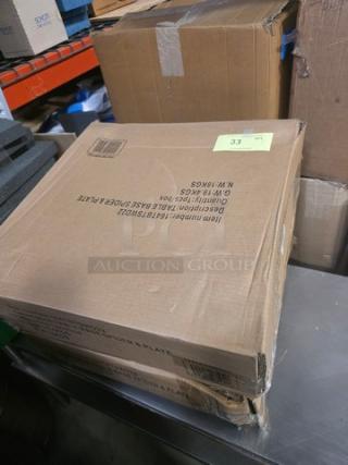 Cardboard box labeled "Table Base Spider & Plate," item number F167SUD02, in good condition, stack of two boxes on a metal surface.