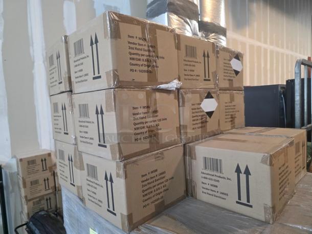 Lot of 10 boxes of 2oz hand sanitizer bottles. Each box labeled with product information. New, unopened condition.