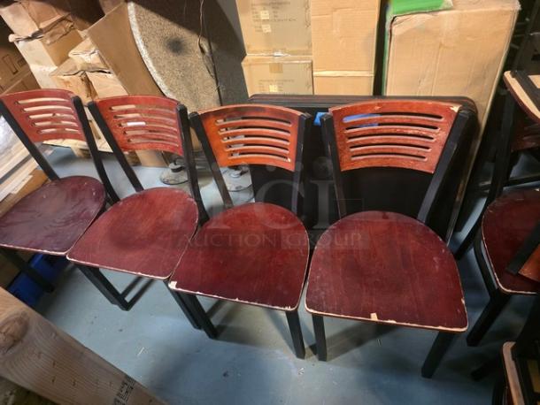 Lot of 4 dining chairs with wooden slat backs and red finish. Moderate wear on seats and legs. Ideal for restoration.