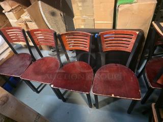 Lot of 4 dining chairs with wooden slat backs and red finish. Moderate wear on seats and legs. Ideal for restoration.