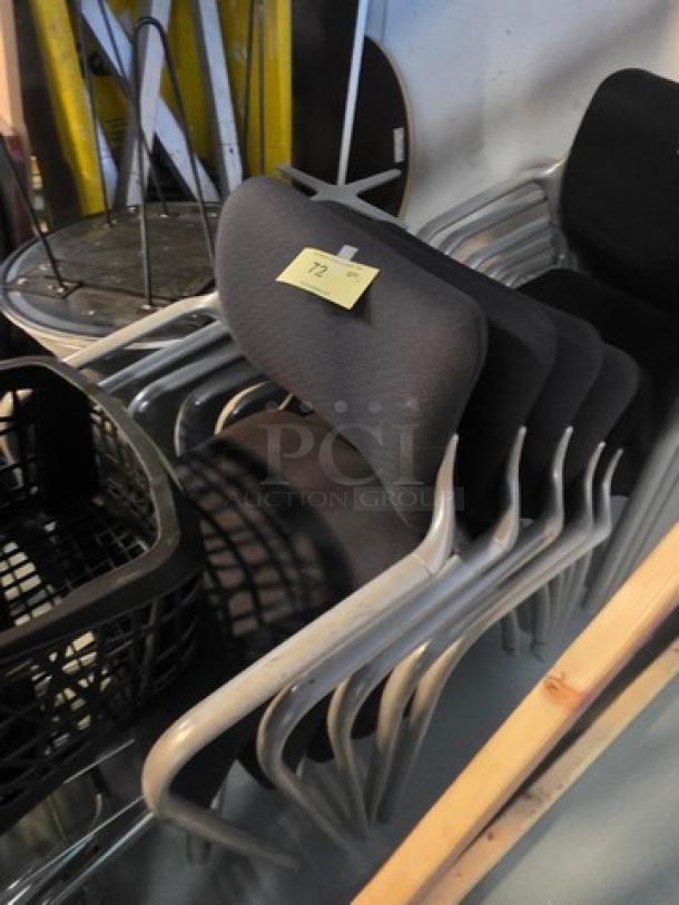 Lot of 5 stacking chairs with black fabric seats, gray powder-coated frames. Good condition, versatile for various settings.