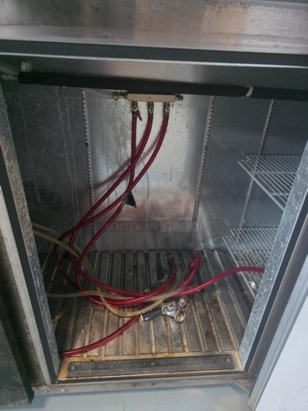 Glastender BB84 Refrigerated Bar Cooler, 84", 6 valve tower, shown with interior shelving and hoses, used condition.