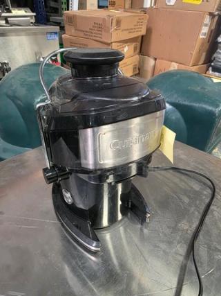 Cuisinart Compact Juice Extractor CJE-500, features stainless steel finish, visible power cord, in used condition.
