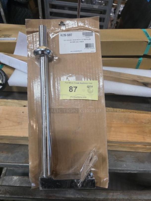 Encore KL26-5012 deck-mounted glass filler, new in packaging, stainless steel, tag indicating model and auction quantity.