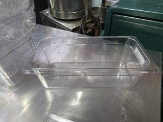 Lot of 13 Cambro plastic food pans, 5 with lids, clear and in good condition. 