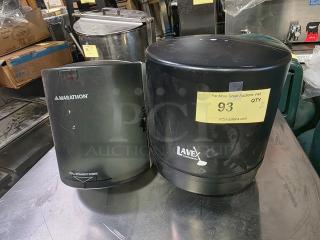 Lot of 2 paper towel dispensers: Marathon and Lavey brands. Black, used condition. Auction label 93, Qty 2.