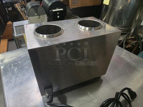 Rohs D2019-2 electric chocolate sauce warmer with dual bottle slots, stainless steel, used condition, power cord attached.
