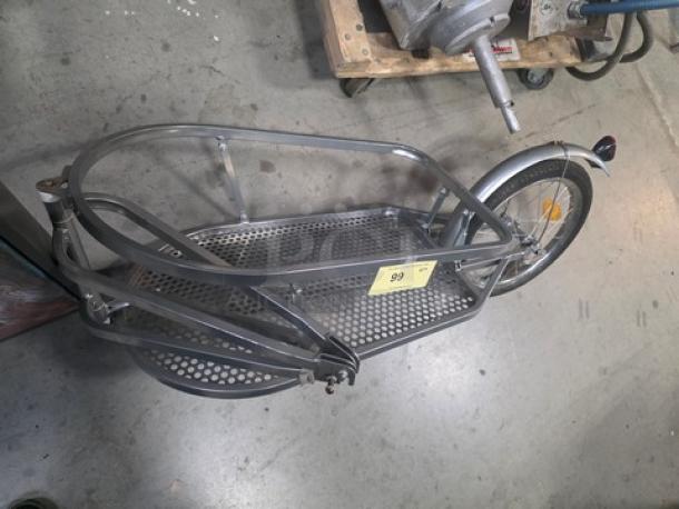BOB Yak Single-Wheel Bicycle Cargo Trailer, metal frame, mesh bottom, single rear wheel, item tag "99". Good condition.