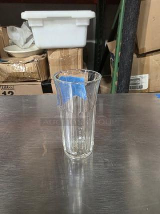 Two boxes of 4 oz juice glasses, clear glass with vertical lines, excellent condition, ideal for beverages.
