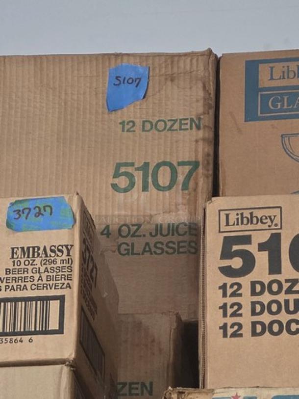Two boxes of 4 oz juice glasses, marked "5107" and "Libbey," 12 dozen per box. Boxes appear sealed and in good condition.