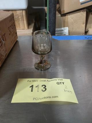 Tawny 3791T 1¾ oz cordial glass displayed in front of open boxes; auction tag showing quantity of 2 boxes.