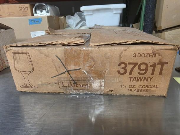 Two boxes of Tawny 3791T 1¾ oz cordial glasses, three dozen per box, visible worn Libbey packaging.