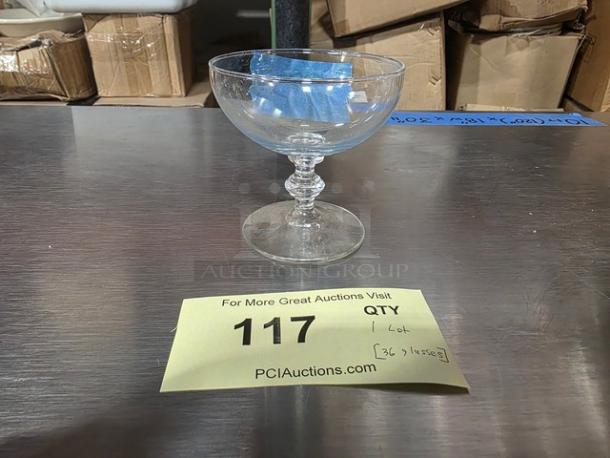 One lot of small clear glass stemware, gently used; includes auction label indicating "Qty 1 Lot, 36 pieces."