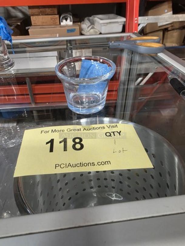 Libbey 5160 2½ oz oyster cocktail glass on a table, part of an auction lot. Clear glass, excellent condition.