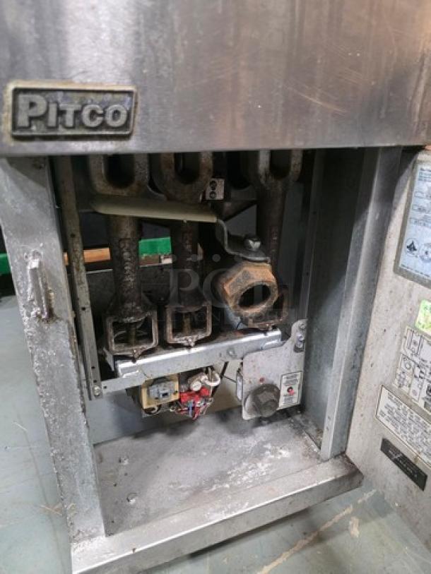 Pitco Natural Gas Floor Fryer, Model 35C+. 35lbs capacity, 90,000 BTU. Visible internal components, used condition.