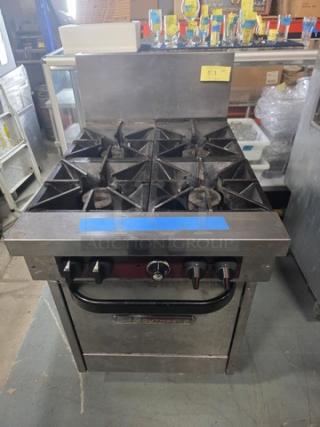 Southbend X424E 24" 4 Burner Gas Range with Space Saver Oven, natural gas. Oven door needs spring repair.