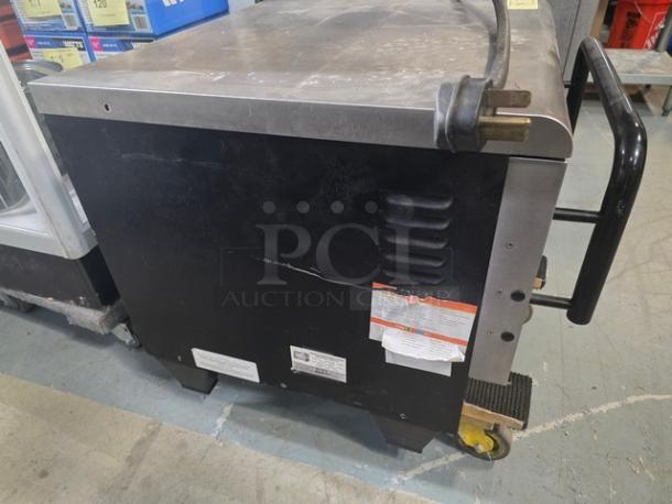 TurboChef NGC Tornado electric countertop rapid cook ventless oven, 208/240V, with visible wear and attached power cord.