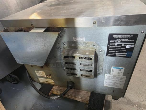 TurboChef NGC Tornado electric countertop rapid cook ventless oven, 208/240V. Stainless steel exterior, labels visible.