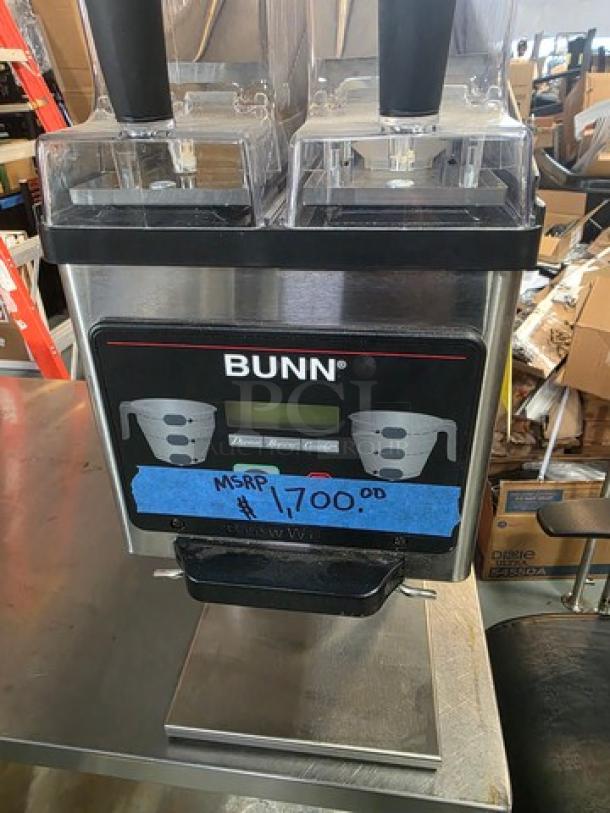 Bunn MHG Multi-Hopper Coffee Grinder in stainless steel, dual hoppers, MSRP tag showing $1700, in good condition.