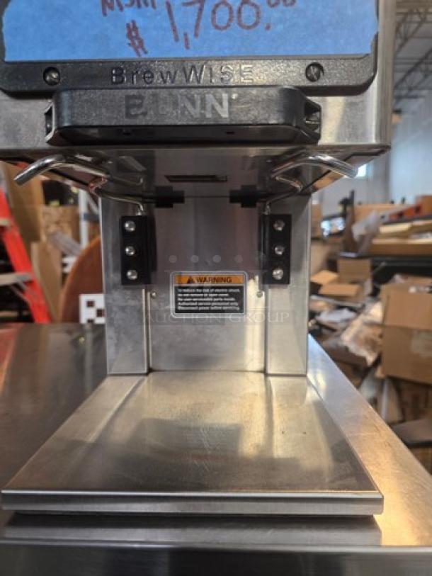 Bunn MHG Multi-Hopper Coffee Grinder, stainless steel, with BrewWISE technology, visible warning label, excellent condition.