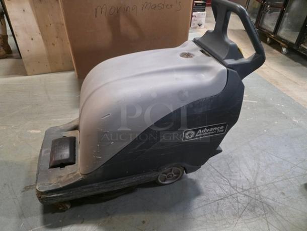 Advance BU800 20B Walk-Behind Battery Floor Burnisher, used condition, visible scuffs, Advance logo on the side.