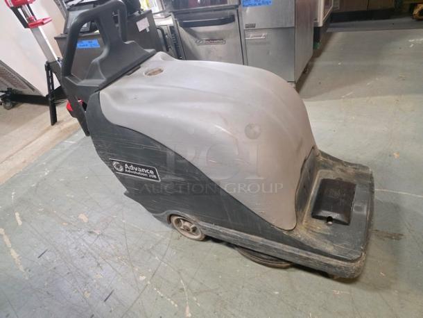 Advance BU800 20B walk-behind battery floor burnisher in used condition, features durable casing and branded side label.