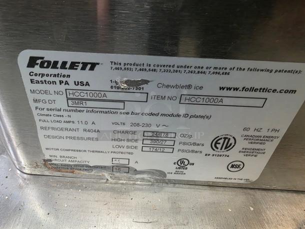 Follett HCC1000A self-contained ice machine, 208-230V, 1 PH, 60 Hz, up to 1000 lbs capacity. Visible label details specs.