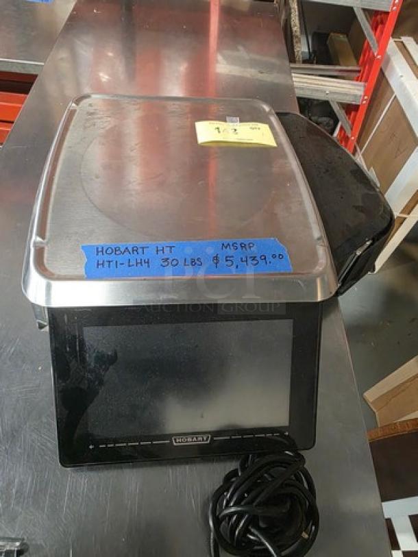 Hobart HT Series HTI-LH4 30 lb. price computing scale, stainless steel, digital display, power cord included.