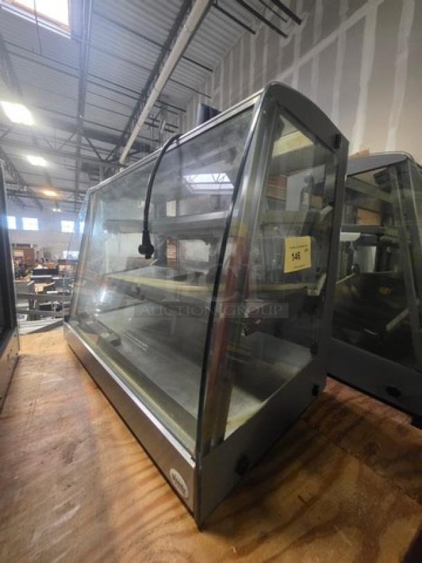 Sanden Vendo HFD000006 hot food display case, 115V, 1PH, glass front, stainless frame, visible interior shelving, good condition.