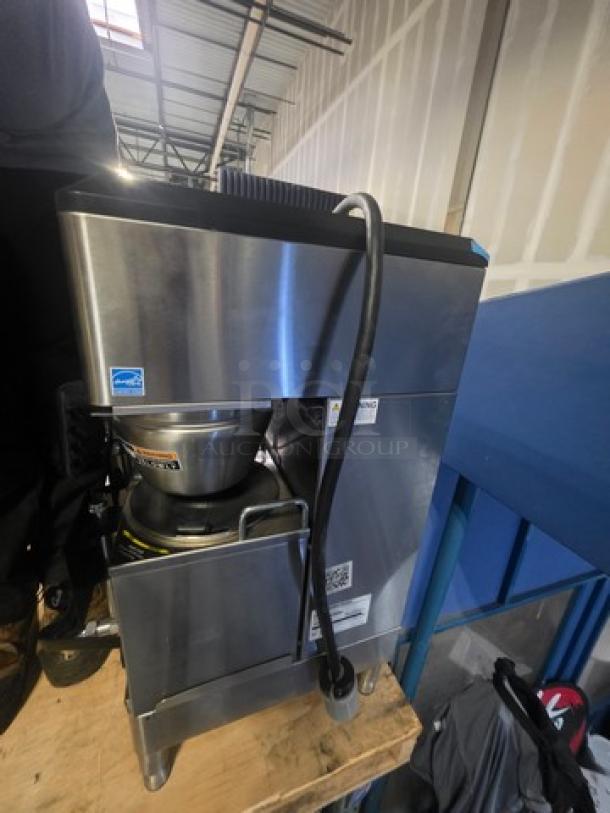 Curtis GEMTIF10A2000 Twin Coffee Brewer with two lower warmers and hot water faucet, stainless steel finish, used condition.