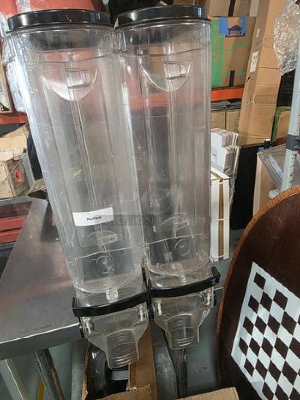 Lot of two 5-gallon gravity bin food dispensers, clear plastic, black lids, excellent condition, labeled "Pro-Pour."