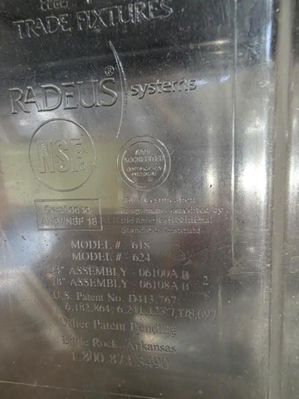 Lot of two 5-gallon Radeus Systems gravity bin food dispensers, clear plastic, NSF certified, models #618 and #624, used condition.