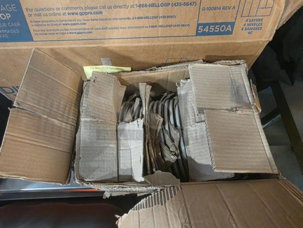 Lot of 23 8" round plates, stacked in an open cardboard box. Plates appear in good condition, suitable for dining use.