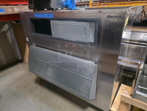 Follett ice storage bin, model SG1325S-60, 1,325lb capacity, stainless steel, visible Follett branding, in good condition.