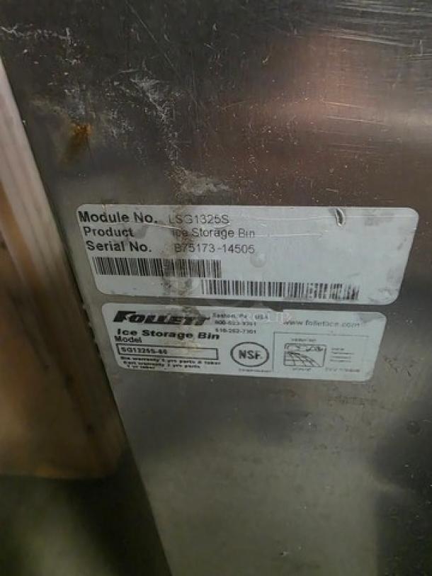 Follett Ice Storage Bin, model SG1325S-60, 1,325lb capacity, shows module and serial numbers, NSF certified.