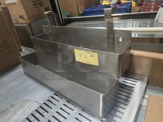 Double-tier stainless steel speed rail, used condition, with mounting brackets. Yellow label indicating "173 QTY" visible.